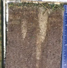Aeration hole in greens soil profile