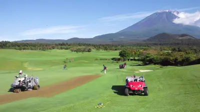 A Hatsuta brand core sweeper in action at Fuji Classic GC